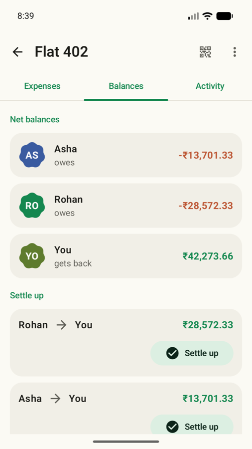 The balances tab showing each member's net position and the settle-up transfers that clear them.